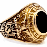 combat navigator ring - left view w/ gold and onyx